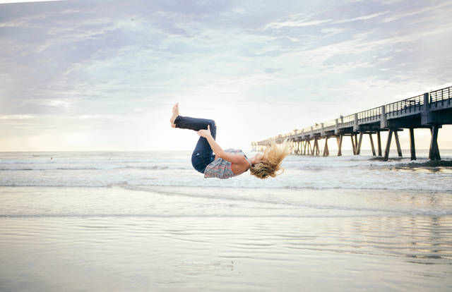 Free Stock Photo of Woman doing a Backflip on the Beach - Public Domain photo - CC0 Images (19723)